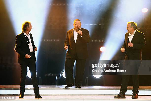 Singer Henning Krautmacher of the German band 'Die Hoehner', actor and singer Dietmar Baer and singer Stefan Gwildis perform during the 'Verstehen...