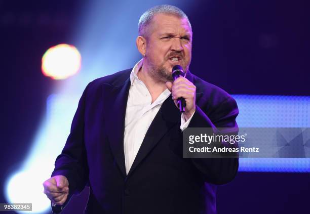 Actor and singer Dietmar Baer performs during the 'Verstehen Sie Spass?' television show on April 10, 2010 in Halle, Germany. Baer performs together...