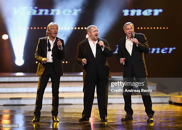 Singer Henning Krautmacher of the German band 'Die Hoehner', actor and singer Dietmar Baer and singer Stefan Gwildis perform during the 'Verstehen...