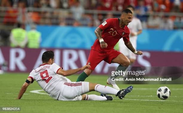 Ricardo Quaresma of Portugal and Morteza Pouraliganji in action during the 2018 FIFA World Cup Russia group B match between Iran and Portugal at...