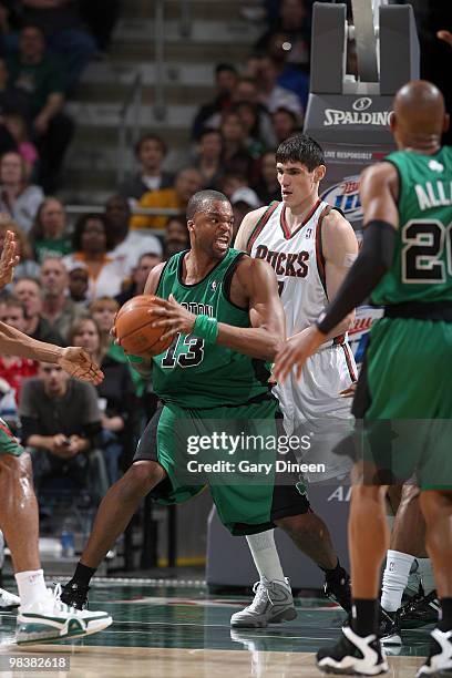 Shelden Williams of the Boston Celtics makes a move towards the basket against Ersan Ilyasova of the Milwaukee Bucks on April 10, 2010 at the Bradley...