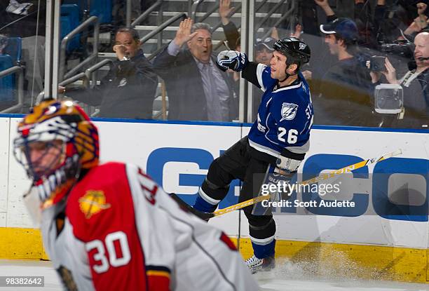 Martin St. Louis of the Tampa Bay Lightning reacts to scoring a goal against the Florida Panthers at the St. Pete Times Forum on April 10, 2010 in...