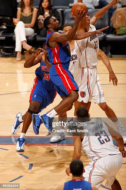 Ben Gordon of the Detroit Pistons goes for the layup against Boris Diaw of the Charlotte Bobcats on April 10, 2010 at the Time Warner Cable Arena in...