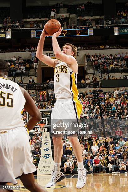 Troy Murphy of the Indiana Pacers shoots a three against the New Jersey Nets at Conseco Fieldhouse on April 10, 2010 in Indianapolis, Indiana. The...