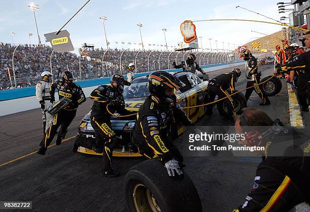 Elliott Sadler, driver of the Stanley Ford, pits during the NASCAR Sprint Cup Series SUBWAY Fresh Fit 600 at Phoenix International Raceway on April...