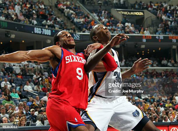 Hasheem Thabeet of the Memphis Grizzlies battles for a rebound against Andre Iquodala of the Philadelphia 76ers on April 10, 2010 at FedExForum in...