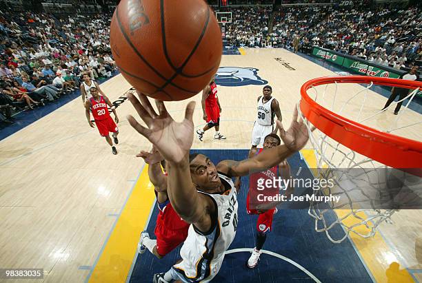 Darrell Arthur of the Memphis Grizzlies shoots the ball against Samuel Dalembert of the Philadelphia 76ers on April 10, 2010 at FedExForum in...