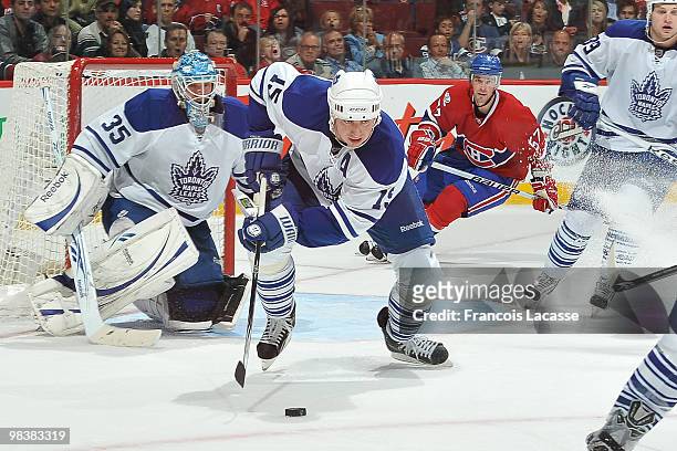 Tomas Kaberle of the Toronto Maple Leafs clear the puck away during the NHL game against the Montreal Canadiens on April 10, 2010 at the Bell Center...