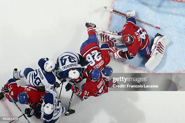 Jaroslav Halak of Montreal Canadiens blocks a shot of Mikhail Grabovski of the Toronto Maple Leafs during the NHL game on April 10, 2010 at the Bell...