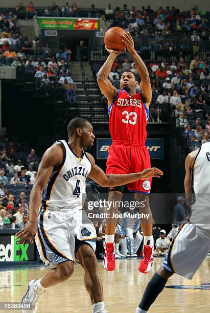 Willie Green of the Philadelphia 76ers shoots over Sam Young of the Memphis Grizzlies on April 10, 2010 at FedExForum in Memphis, Tennessee. NOTE TO...