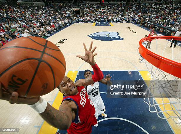 Marreese Speights of the Philadelphia 76ers shoots against Zach Randolph of the Memphis Grizzlies on April 10, 2010 at FedExForum in Memphis,...