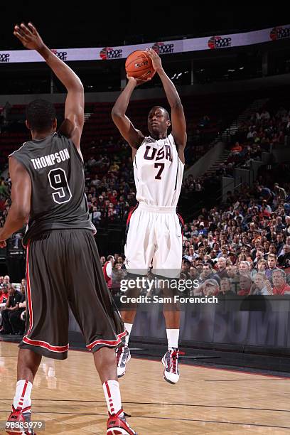 Harrison Barnes of the USA Junior National Select Team takes a shot over Tristan Thompson of the World Select Team on April 10, 2010 at the Rose...