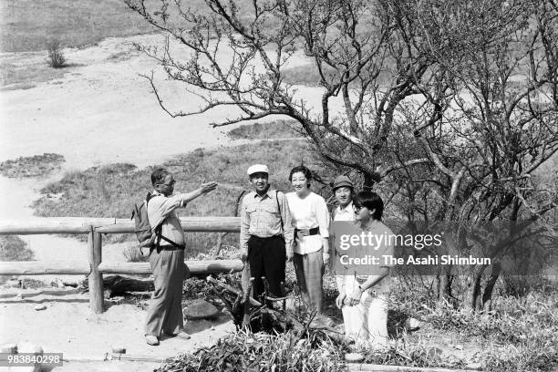 Crown Prince Akihito, Crown Princess Michiko, Prince Naruhito and Prince Fumihito trek Senjogahara on June 7, 1987 in Nikko, Tochigi, Japan.