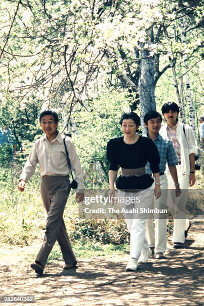 Crown Prince Akihito, Crown Princess Michiko, Prince Naruhito and Prince Fumihito trek Senjogahara on June 7, 1987 in Nikko, Tochigi, Japan.