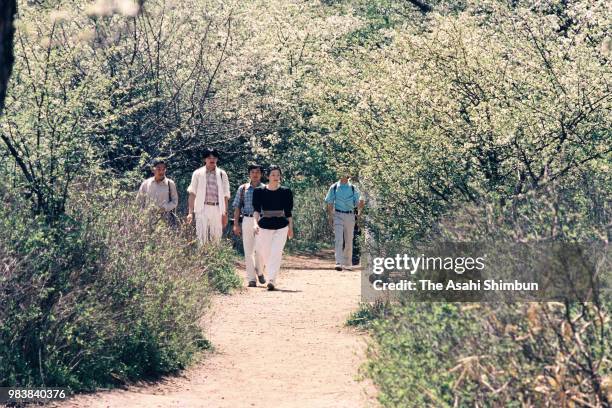 Crown Prince Akihito, Crown Princess Michiko, Prince Naruhito and Prince Fumihito trek Senjogahara on June 7, 1987 in Nikko, Tochigi, Japan.