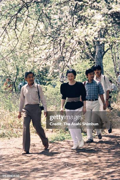 Crown Prince Akihito, Crown Princess Michiko, Prince Naruhito and Prince Fumihito trek Senjogahara on June 7, 1987 in Nikko, Tochigi, Japan.