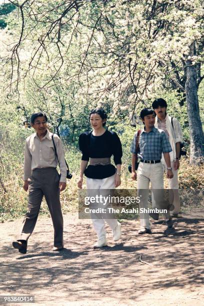 Crown Prince Akihito, Crown Princess Michiko, Prince Naruhito and Prince Fumihito trek Senjogahara on June 7, 1987 in Nikko, Tochigi, Japan.