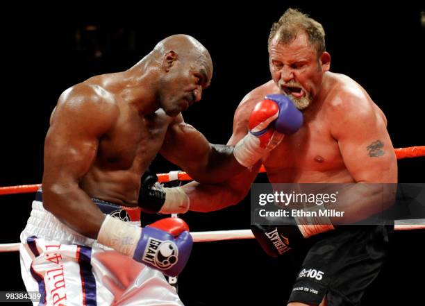 Evander Holyfield hits Francois Botha in the seventh round of their heavyweight bout at the Thomas & Mack Center April 10, 2010 in Las Vegas, Nevada....