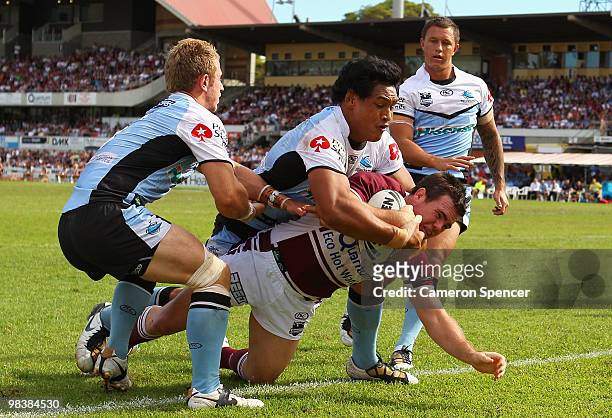 Jamie Lyon of the Sea Eagles scores a try during the round five NRL match between the Manly Sea Eagles and the Cronulla Sharks at Brookvale Oval on...