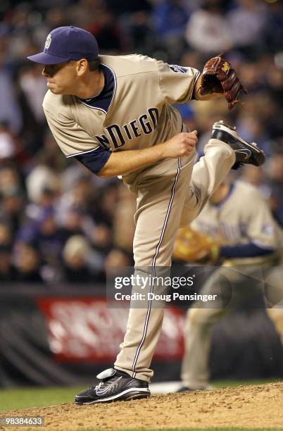 Relief pitcher Tim Stauffer of the San Diego Padres delivers against the Colorado Rockies during MLB action at Coors Field on April 10, 2010 in...