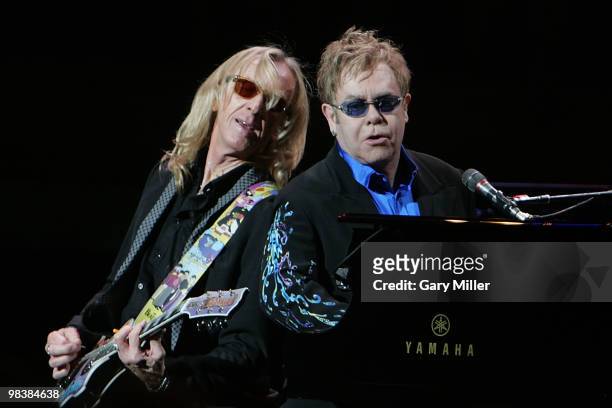 Musician/vocalist Sir Elton John and musician Davey Johnstone perform in concert at The Frank Erwin Center on April 10, 2010 in Austin, Texas.