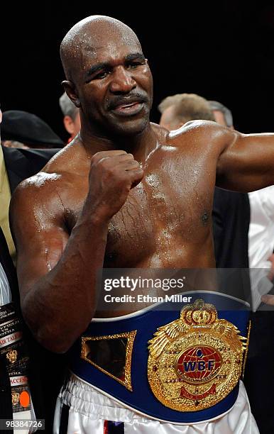 Evander Holyfield celebrates his eighth-round TKO victory over Francois Botha in their heavyweight bout at the Thomas & Mack Center April 10, 2010 in...