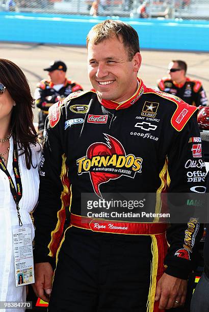 Ryan Newman, driver of the Tornados Chevrolet, smiles from the grid before the NASCAR Sprint Cup Series SUBWAY Fresh Fit 600 at Phoenix International...