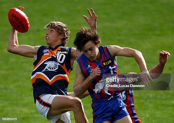 Tom Sheridan of the Cannons takes a mark during the round three TAC Cup match between Oakleigh Chargers and Calder Cannons on April 11, 2010 in...