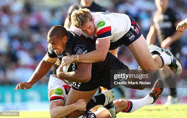 Frank Pritchard of the Panthers is tackled during the round five NRL match between the Penrith Panthers and the Sydney Roosters at CUA Stadium on...