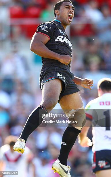 Michael Jennings of the Panthers celebrates his try during the round five NRL match between the Penrith Panthers and the Sydney Roosters at CUA...