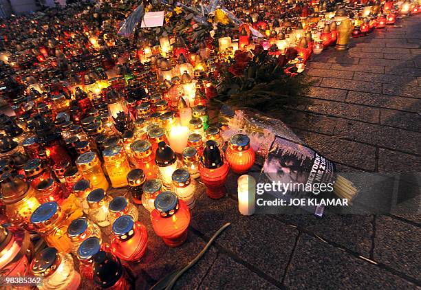 Newspaper clipping features the late Polish president Lech Kaczynski with the headline ''The President is not alive'' in front of the presidential...