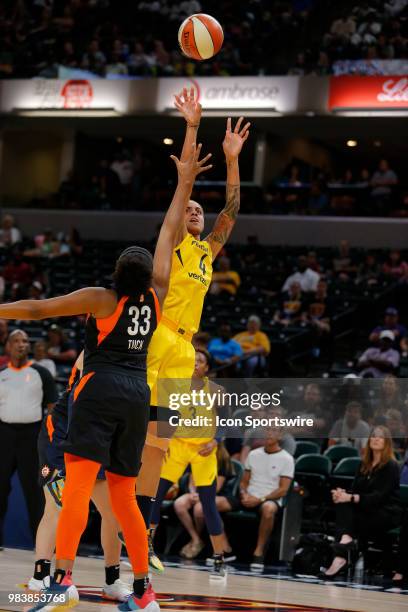 Indiana Fever forward Candice Dupree with the jump shot over Connecticut Sun forward Morgan Tuck during the game between the Connecticut Sun and...