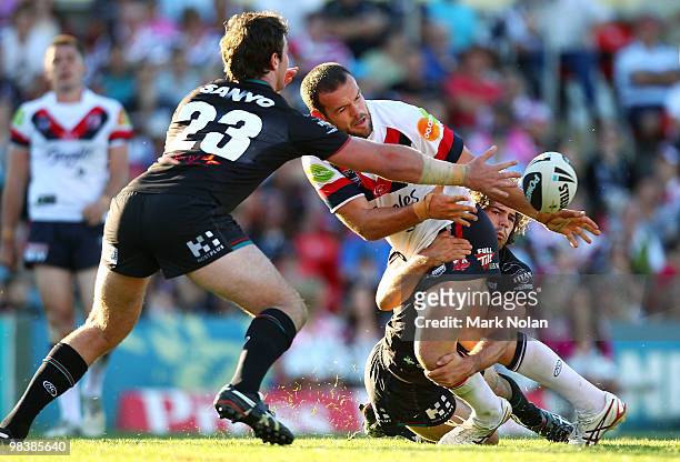 Nate Myles of the Roosters offloads during the round five NRL match between the Penrith Panthers and the Sydney Roosters at CUA Stadium on April 11,...