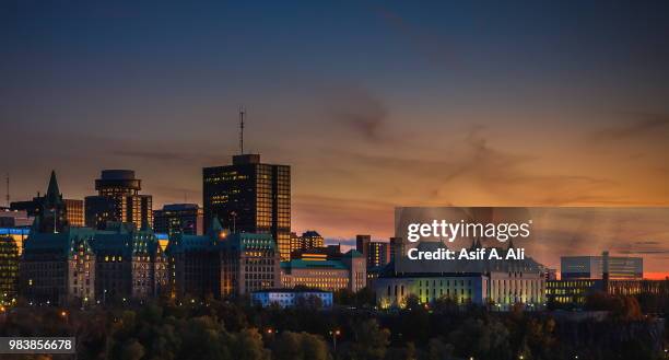 downtown ottawa's sunning sunset. - ottawa skyline stock pictures, royalty-free photos & images