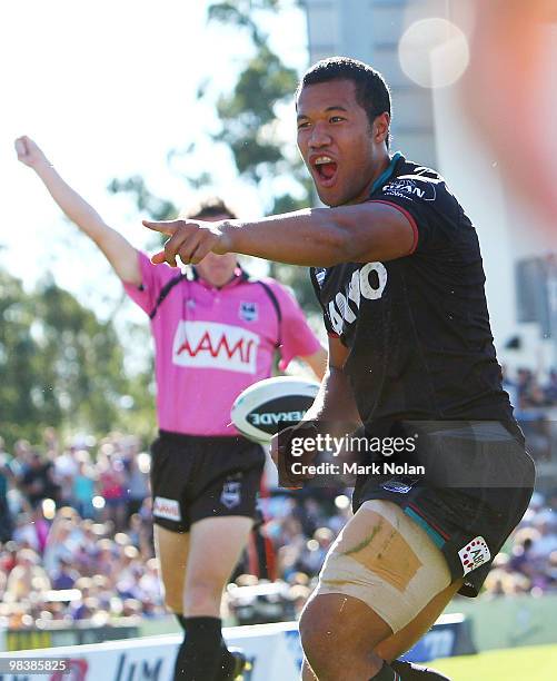 Joseph Paulo of the Panthers celebrates his try during the round five NRL match between the Penrith Panthers and the Sydney Roosters at CUA Stadium...