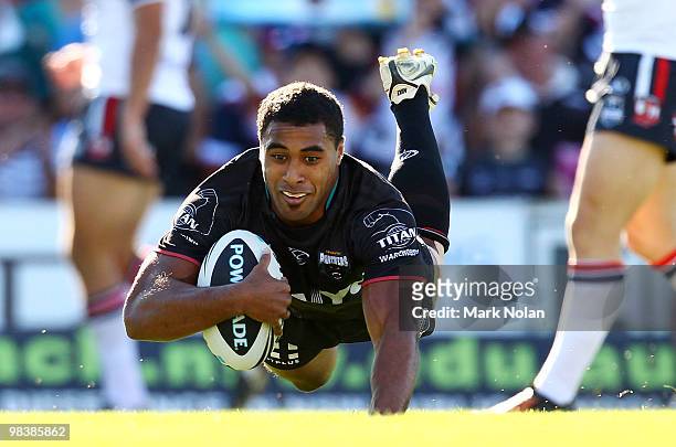 Michael Jennings of the Panthers scores a try during the round five NRL match between the Penrith Panthers and the Sydney Roosters at CUA Stadium on...