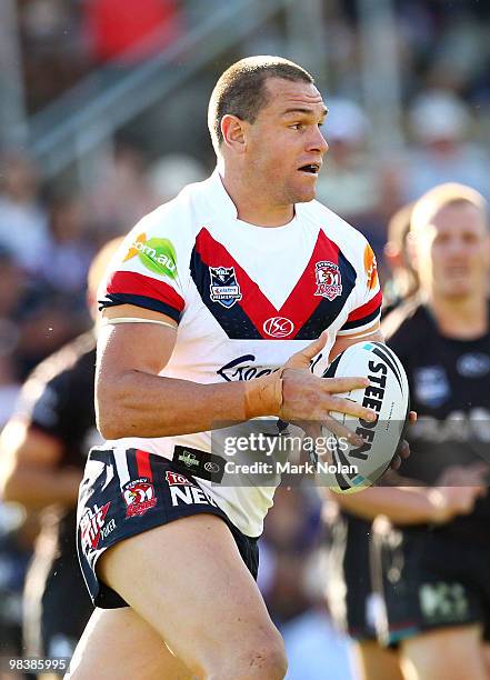 Jason Ryles of the Roosters runs the ball during the round five NRL match between the Penrith Panthers and the Sydney Roosters at CUA Stadium on...