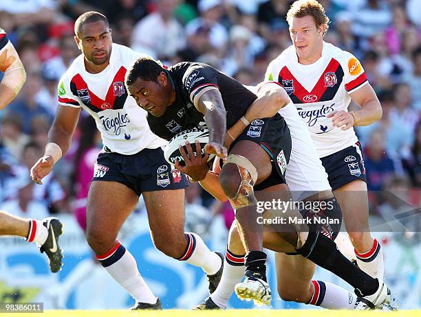 Petero Civoniceva of the Panthers is tackled during the round five NRL match between the Penrith Panthers and the Sydney Roosters at CUA Stadium on...