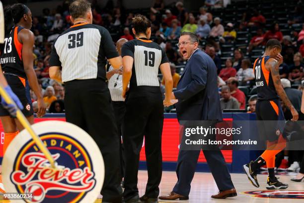 Connecticut Sun Head Coach Curt Miller voices his concern to WNBA Official Tiara Cruse during the game between the Connecticut Sun and Indiana Fever...