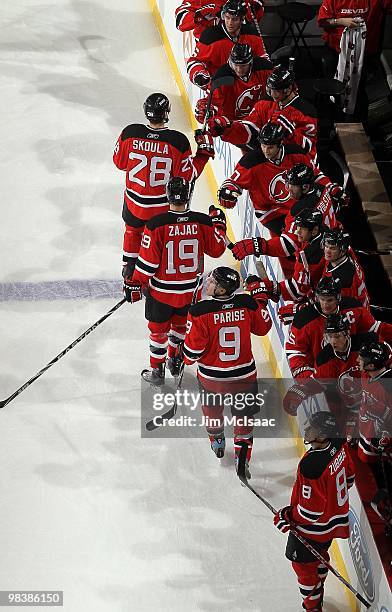 The New Jersey Devils celebrate their first goal against the New York Islanders scored by Dainius Zubrus at the Prudential Center on April 10, 2010...