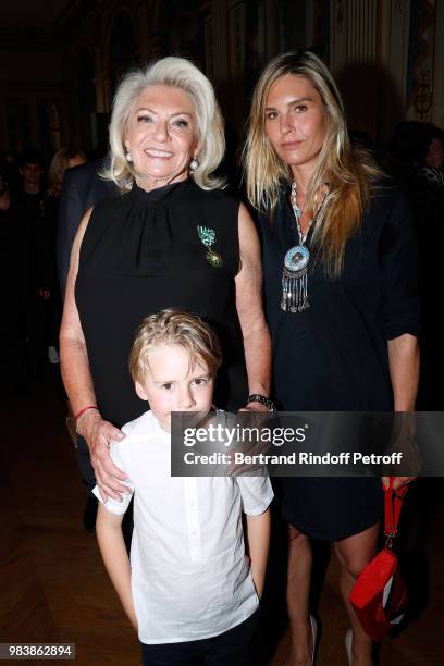 Elisabeth Dauchy, decorated "Officier des Arts et des Lettres", her daughter Garance and her grandson attend Decorations are given at "Ministere de...