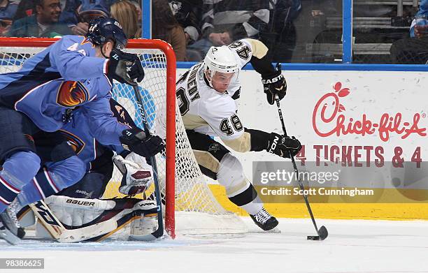 Tyler Kennedy of the Pittsburgh Penguins carries the puck against the Atlanta Thrashers at Philips Arena on April 10, 2010 in Atlanta, Georgia.