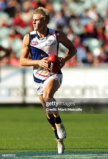 David Mackay of the Crows looks for a teammate during the round three AFL match between the Melbourne Demons and the Adelaide Crows at Melbourne...