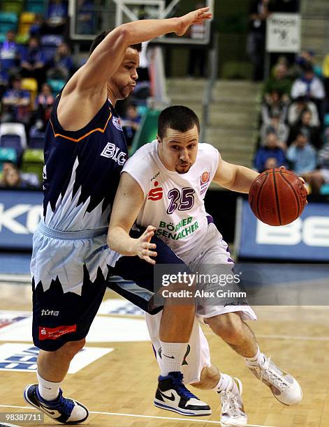 Jan Schiecke of Goettingen is challenged by Jan Lipke of Bremerhaven during the third place game between BG Goettingen and Eisbaeren Bremerhaven at...