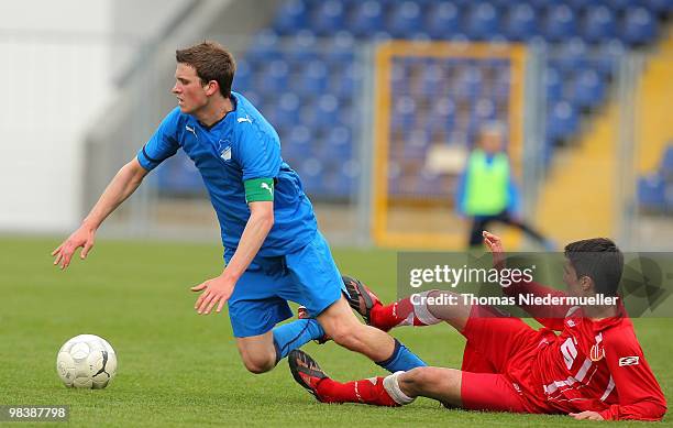 Pascal Gross of Hoffenheim fights for the ball with Leonardo Bittencourt of Cottbus during the DFB Juniors Cup half final between TSG 1899 Hoffenheim...