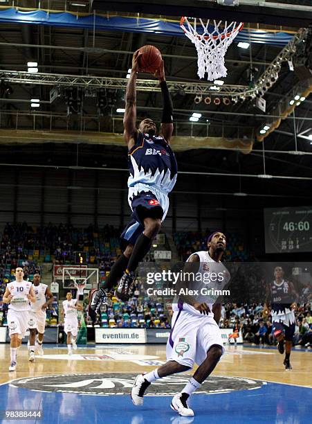 Brandon Brooks of Bremerhaven dunks the ball against Antoine Jordan of Goettingen during the third place game between BG Goettingen and Eisbaeren...