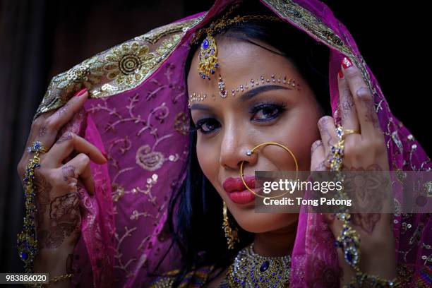 close up beautiful indian girl young hindu woman model with kund - kund stock pictures, royalty-free photos & images