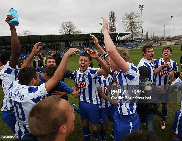 The team of Berlin celebrates after winning the DFB Juniors Cup half final between Hertha BSC Berlin and VfL Bochum at the Amateurstadion of Hertha...