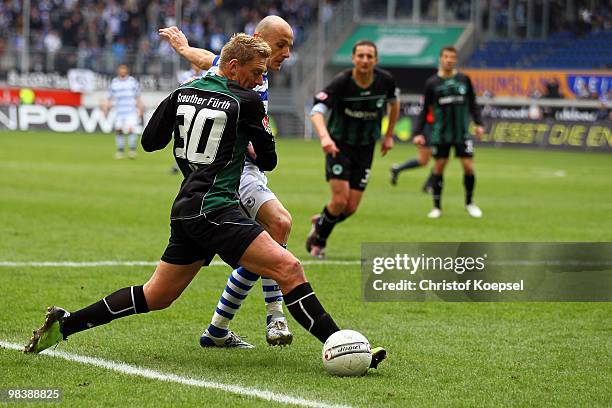 Christian Rahn of Fuerth challanges Srdjan Baljak of Duisburg during the Second Bundesliga match between MSV Duisburg and SpVgg Greuther Fuerth at...