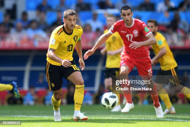 Eden Hazard of Belgium and Ellyes Skhiri of Tunisia compete for the ball during the 2018 FIFA World Cup Russia group G match between Belgium and...